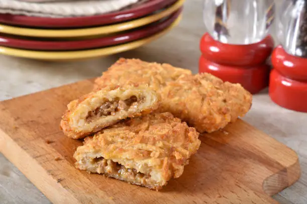 Hashbrowns stuffed with sausage and cheese