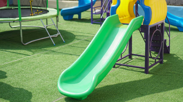 istock playground on yard in the park.without children. 1204743792