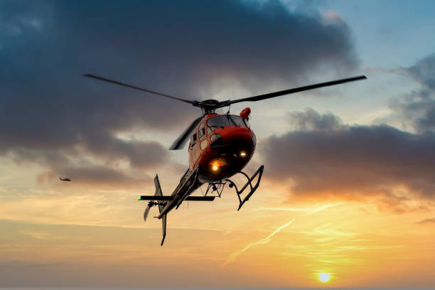 istock Water bombing fire fighting helicopter in action in Australia 1204751892