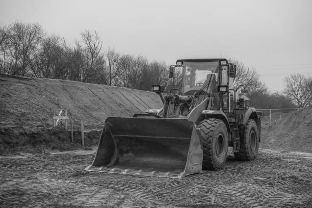 istock a building site there is an orange excavator preparing the ground for foundations 1204754891