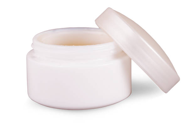 istock The opened face cream container isolated on white background 1204755181