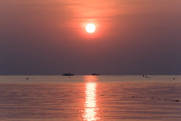 istock Beautiful sunset at the sea 1204756118