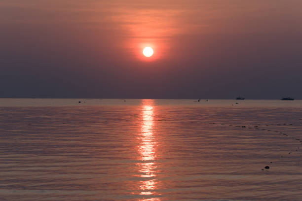 istock Beautiful sunset at the sea 1204756125