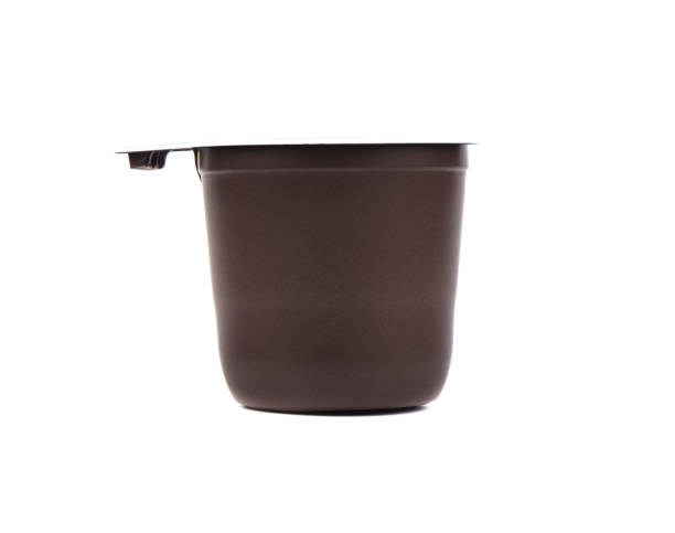 istock Brown plastic cup for coffee or tea isolated on a white background. 1204757606