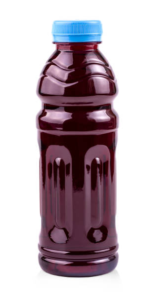 istock Bottle of juice isolated on white background 1204758701