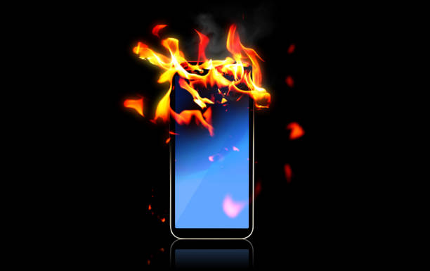 Burning smartphone Photographed in Japan. inferno stock pictures, royalty-free photos & images