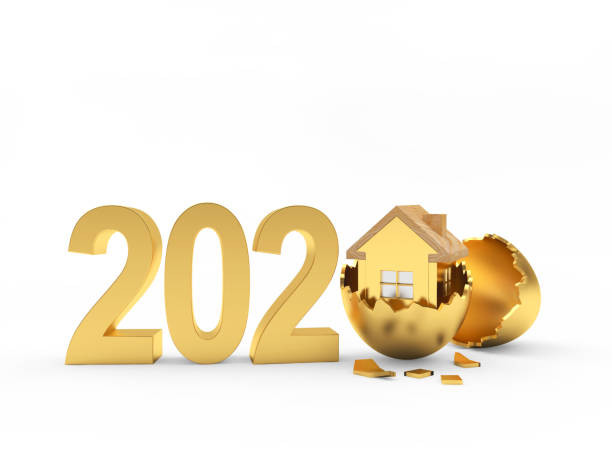 istock 2020 and golden house icon on a broken Easter egg 1204767606