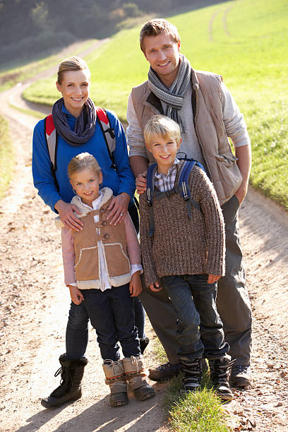 istock Young family hiking through park 120476841