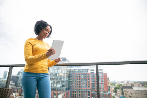 istock Woman With a Digital Tablet 1204773865