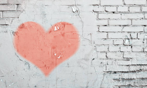 istock old wall, heart graffiti, Valentine's day background 1204775004