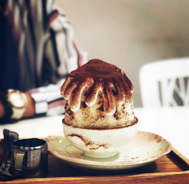 With milk ice, milo nuggets, milo crunch, milo sauce as well as creme chantilly and milo powder.