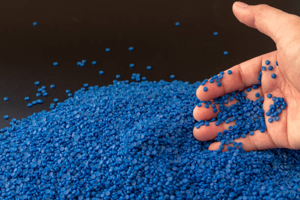 istock Close-up of plastic polymer granules. polymer plastic. compound polymer.plastic beads isolated on white background. 1204779854