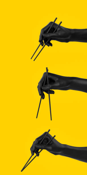 conjunto de mão preta usando pauzinhos isolados em amarelo, sushi food no menu japonês menu conceito 3d ilustração. - chopsticks human hand women isolated - fotografias e filmes do acervo