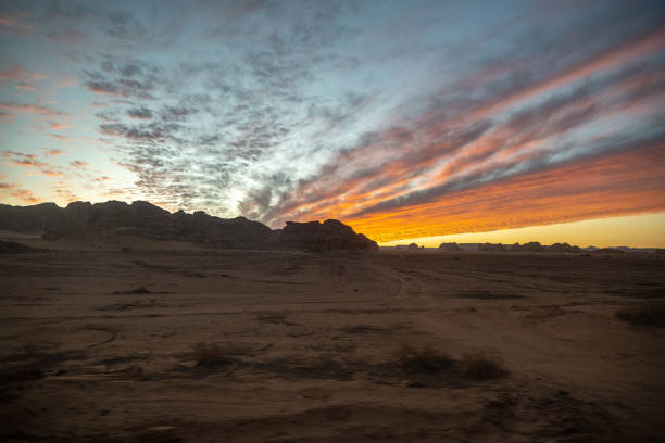 Outcrop geological formations at Sunset, Al Ula in Saudi Arabia Naturally formed sandstone and limestone formations in the Al Madinah area of western Saudi Arabia. madain saleh photos stock pictures, royalty-free photos & images