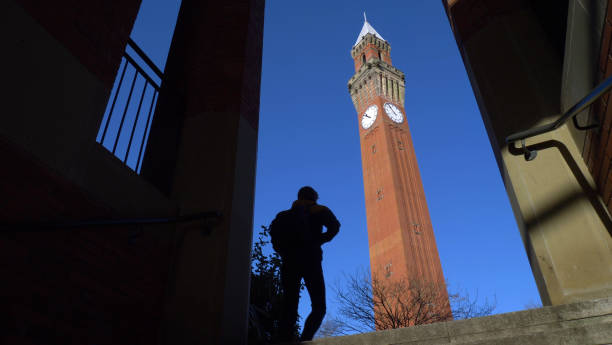 Birmingham University - Student and clock tower. stock photo