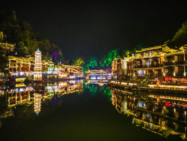 Scenery view in the night of fenghuang old town .phoenix ancient town or Fenghuang County is a county of Hunan Province, China Scenery view in the night of fenghuang old town .phoenix ancient town or Fenghuang County is a county of Hunan Province, China fenghuang county photos stock pictures, royalty-free photos & images
