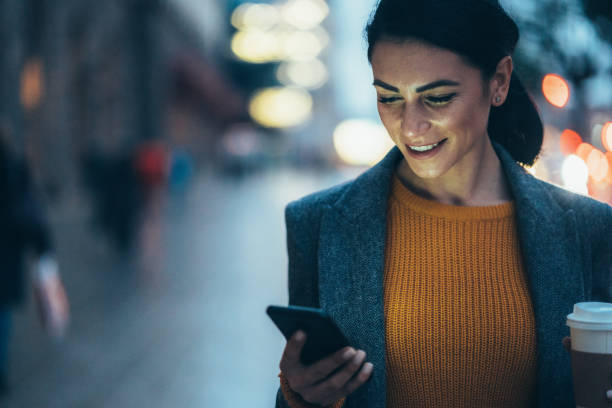 istock Texting in the city 1204790393