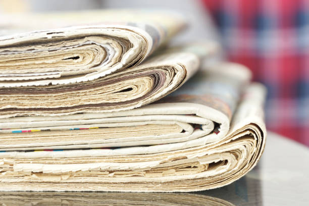istock Pile of Newspapers on the table 1204790645