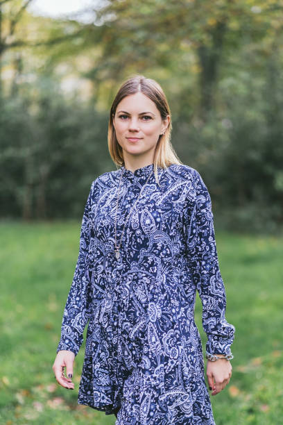 istock Beautiful woman walking in nature 1204796731