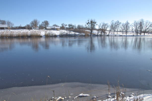 istock The lake was covered with young ice. 1204797726