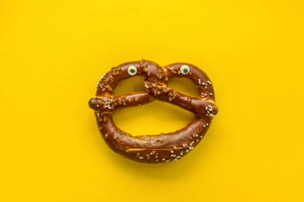 istock Soft pretzel with a funny face 1204799347