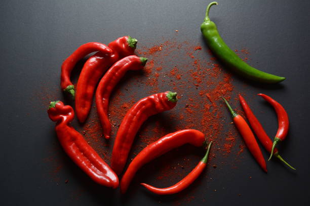 istock Fresh and dried chili peppers 1204806420