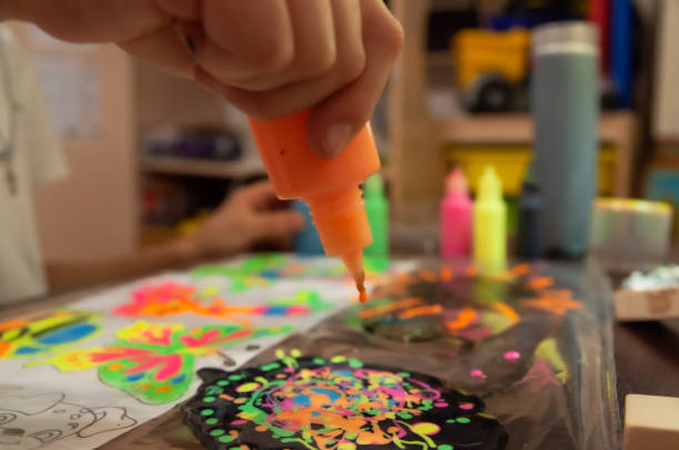 istock squeezes acrylic paint out of a tube 1204809084