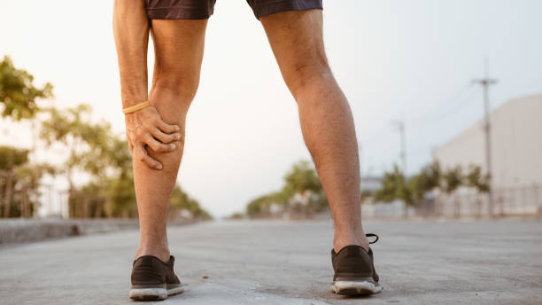 istock Young sport man having calf ache and problem after exercise . sport and healthy concepts 1204811752
