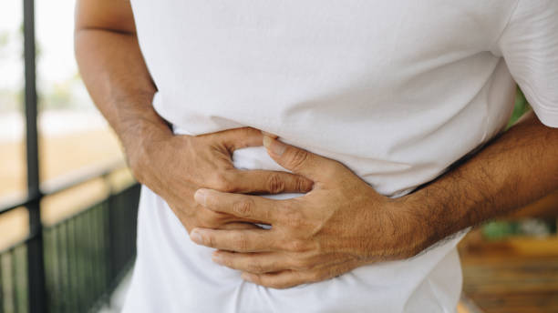istock Man having painful stomach ache 1204811770
