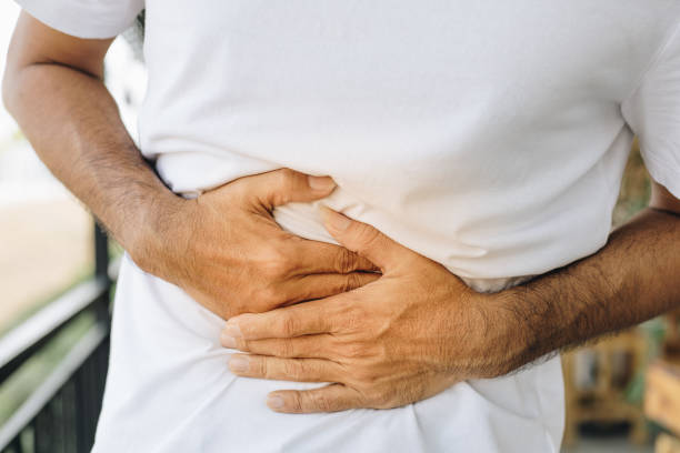 istock Man having painful stomach ache 1204811776