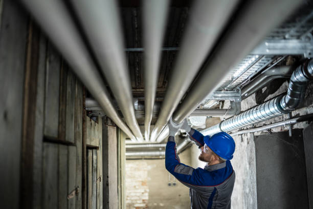 istock Male Worker Inspecting Pipes 1204813747
