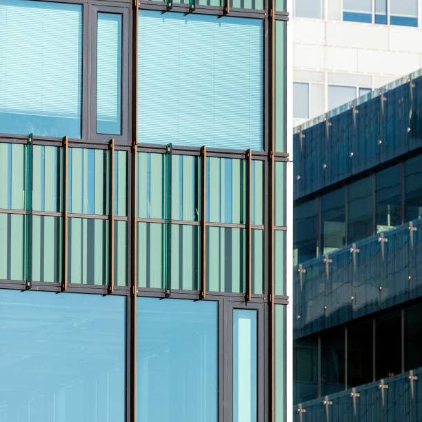 istock abstract patterns and reflections in windows of modern office buildings 1204815781