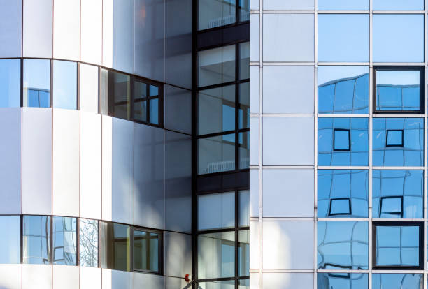 istock abstract patterns and reflections in windows of modern office buildings 1204815790