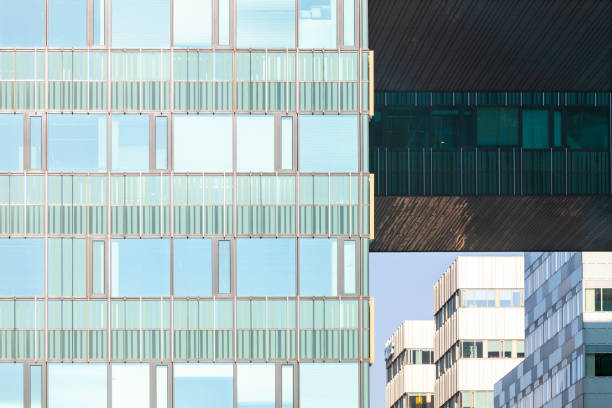 istock abstract patterns and reflections in windows of modern office buildings 1204815812