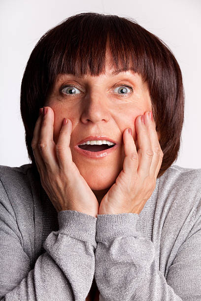 istock Surprise mid adult woman 120481638