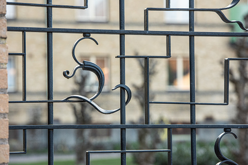 Detail of a wrought iron gate.