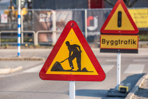 istock Sign showing roadworks at a crossing. 1204821655