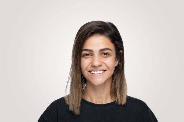 istock Beautiful young women smiling to camera 1204826829