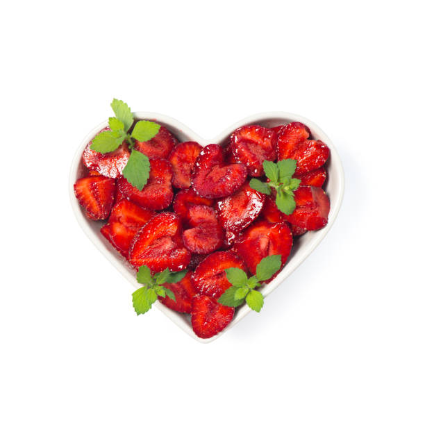 istock Strawberries heart Valentines day background 1204829636