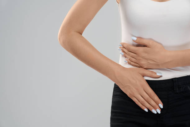 istock Woman suffering from bellyache. 1204834576