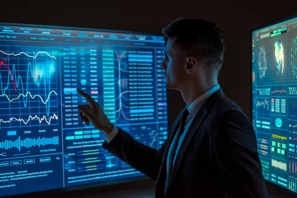 istock The man working on a sensor blue display in the dark space 1204838534