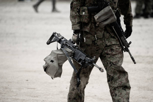 istock Japanese soldier carring machine gun. 1204841089