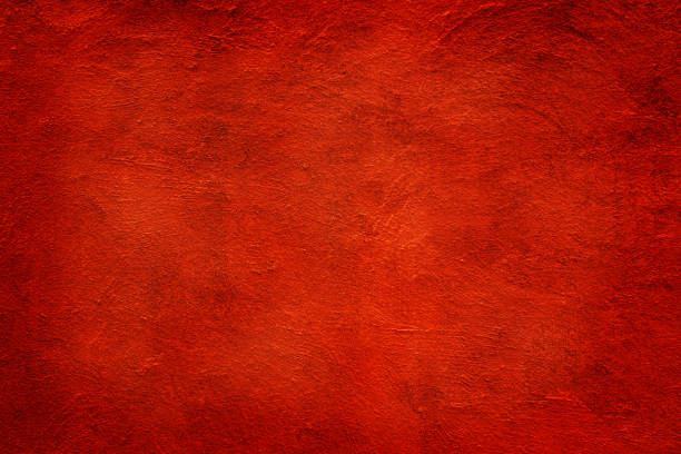 istock Orange clay wall grunge texture background for interior decoration. 1204843370