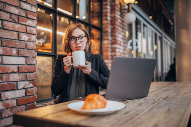 istock Blogger is having coffee and croissant 1204852580