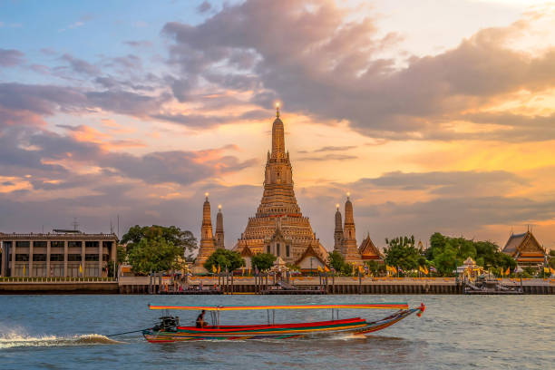 istock Wat Arun along Chao Phraya River during sunset, a popular place for foreigners visiting thailand to visit, Bangkok, Thailand. 1204854300