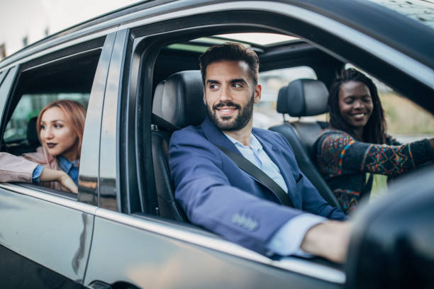 istock Friends traveling by a car 1204855935