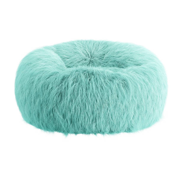 istock Turquoise fluffy round pouf on an isolated background. 3D rendering 1204856177