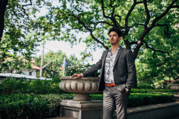 istock Stylish guy in gray suit 1204857805