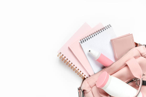 istock Flat lay, Women's accessories pink backpack, glider, water bottle and spray for the face on a white background, trend things girl generation z, fashion background 1204858013