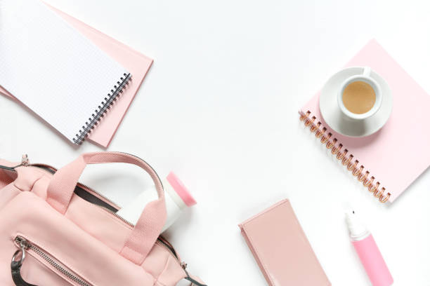istock Flat lay, Women's accessories pink backpack, glider, water bottle and spray for the face on a white background, trend things girl generation z, fashion background 1204858040